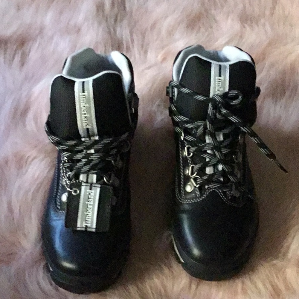 Timberland black boots with white trim ( NEW )